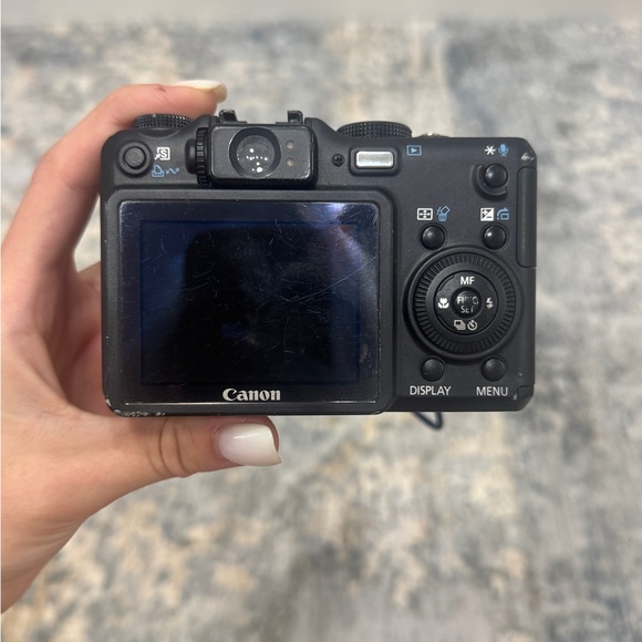 Canon g7 powershot camera. Comes with battery charger and memory card